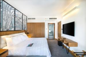 Postel nebo postele na pokoji v ubytování Le Meridien Abu Dhabi