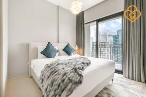 Postel nebo postele na pokoji v ubytování Keysplease New 1 BR Apt Business Bay, Zada Tower