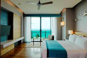 Rayong Marriott Resort & Spa客房内的一张或多张床位
