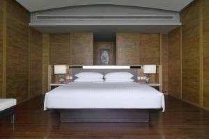 Rayong Marriott Resort & Spa客房内的一张或多张床位