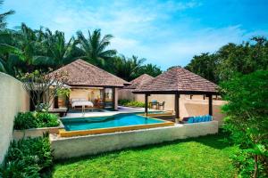 a villa with a swimming pool and a gazebo at Sheraton Hua Hin Pranburi Villas in Pran Buri