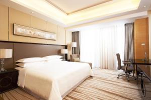 Postel nebo postele na pokoji v ubytování Four Points by Sheraton Langfang, Gu'an