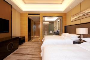 Postel nebo postele na pokoji v ubytování Four Points by Sheraton Langfang, Gu'an