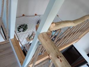 a view from the top of the stairs in a house at Chatka Święty Spokój in Piotrowice
