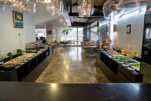 a buffet line with many plates of food at Business Life Boutique Hotel & Spa in Istanbul