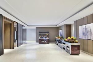 a lobby of a hotel with fruit on display at Courtyard by Marriott Siliguri in Siliguri