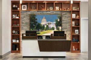 a lobby with a mural of the capitol building at Four Points by Sheraton Sacramento Airport in Sacramento