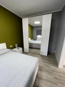 Postel nebo postele na pokoji v ubytování RESIDENCE GORDON