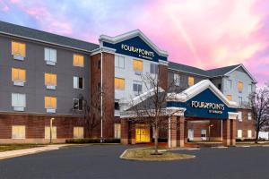 a rendering of the front of a hotel at Four Points by Sheraton St. Louis - Fairview Heights in Fairview Heights