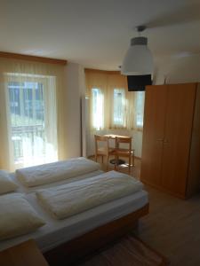 Tempat tidur dalam kamar di Ottenkellerhof