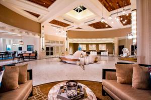 a large living room with couches and a table at Playa Largo Resort & Spa, Autograph Collection in Key Largo