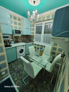 Η κουζίνα ή μικρή κουζίνα στο EWA Apartman