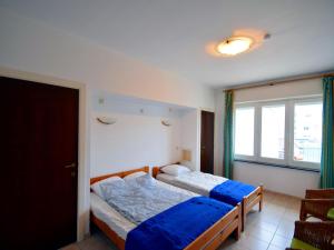 Voodi või voodid majutusasutuse Seaside Stay w Large Terrace toas