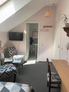 TV a/nebo společenská místnost v ubytování Valentina's Rooms + 30 fotografií