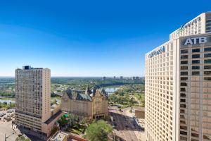 an aerial view of two tall buildings in a city at The Westin Edmonton in Edmonton