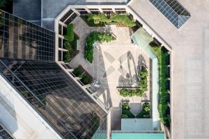 an overhead view of a building with a garden at Renaissance Mobile Riverview Plaza Hotel in Mobile