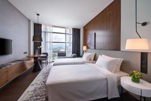 Postel nebo postele na pokoji v ubytování Le Meridien Petaling Jaya + 27 fotografií