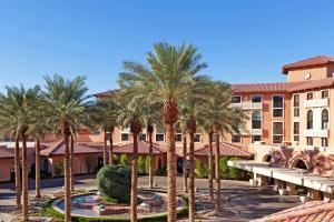 a group of palm trees in front of a building at The Westin Lake Las Vegas Resort & Spa in Las Vegas
