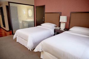 Cama ou camas em um quarto em Sheraton Lima Historic Center