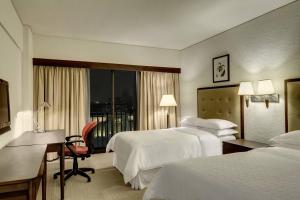 Cama ou camas em um quarto em Sheraton Lima Historic Center