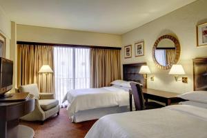 Cama ou camas em um quarto em Sheraton Lima Historic Center