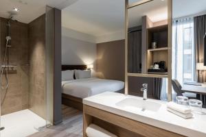 Postel nebo postele na pokoji v ubytování AC Hotel by Marriott Wuerzburg