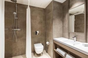 Koupelna v ubytování AC Hotel by Marriott Wuerzburg