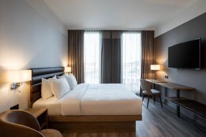 Postel nebo postele na pokoji v ubytování AC Hotel by Marriott Wuerzburg