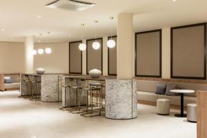 Posezení v ubytování AC Hotel by Marriott Wuerzburg
