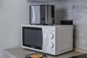 Kuchyň nebo kuchyňský kout v ubytování SWEET HOME, Wi-fi, Netflix, Disney Plus, Prime video