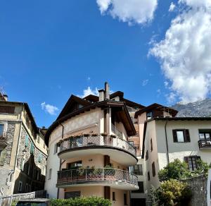 a building with a cross on the top of it at Alpine Escape in Bormio