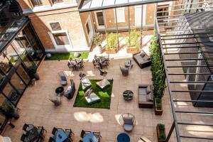 an overhead view of a patio in a building at AC Hotel by Marriott Wroclaw in Wrocław