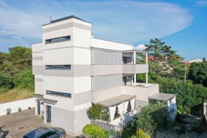 an aerial view of a white building at Apartments Mato in Zadar