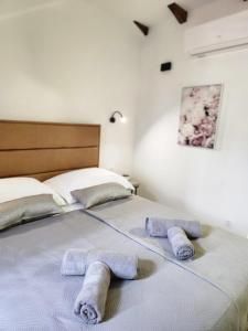Rio Luxury Rooms客房内的一张或多张床位