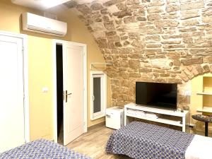 A television and/or entertainment centre at Solo Vip
