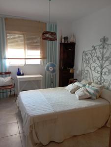 Posteľ alebo postele v izbe v ubytovaní Buenavista Home Moncofar
