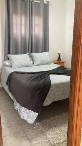 Posteľ alebo postele v izbe v ubytovaní Lovely two bedroom apartment with amazing view