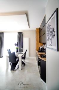 Posedenie v ubytovaní Marina Apartament 13 Iława - z prywatnym miejscem parkingowym