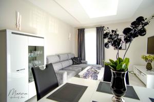 Posedenie v ubytovaní Marina Apartament 13 Iława - z prywatnym miejscem parkingowym