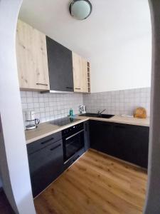 Kuchyň nebo kuchyňský kout v ubytování Bichlerhof
