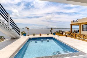 a swimming pool on the deck of a house at The Lor-E-Lei House in San Pedro