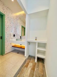 Giường trong phòng chung tại Hotel Nomadic Design