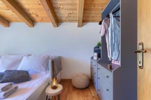 Łóżko lub łóżka w pokoju w obiekcie House Ana