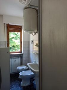 Koupelna v ubytování Appartamento spazioso con terrazzo di proprietà