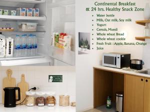 A kitchen or kitchenette at Evergreen Cafe and Hotel