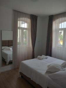 Postel nebo postele na pokoji v ubytování Marjan apartment & rooms