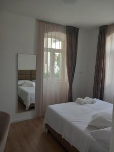 Postel nebo postele na pokoji v ubytování Marjan apartment & rooms