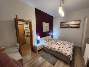 Postel nebo postele na pokoji v ubytování Studio Midtown