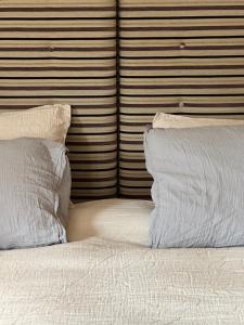 Кровать или кровати в номере Chalet Violettes