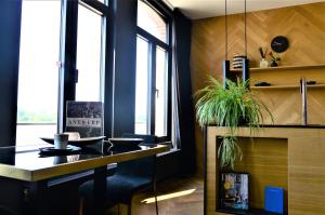 Köök või kööginurk majutusasutuses Kaai11 - Riverview Lofts & Suites +37 fotot